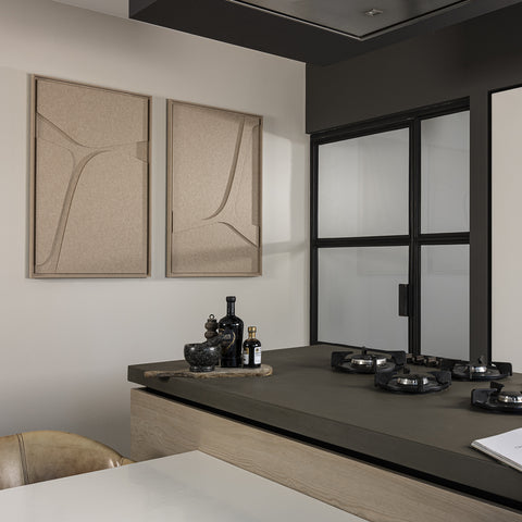Modern kitchen with black countertops and abstract wall feltArt 'Serene' in the color pale sand, 70x110.