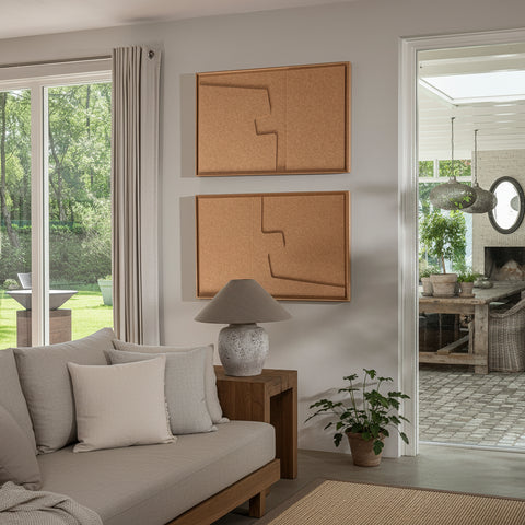 FeltArt 'Estile' in the color soft dune 70x110 on a wall with a bench and lamp in the foreground.