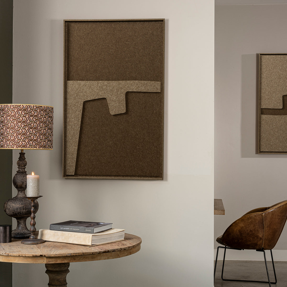 Modern interior with FeltArt 'Estile' in the color olive mist 70x110, table, and chair.